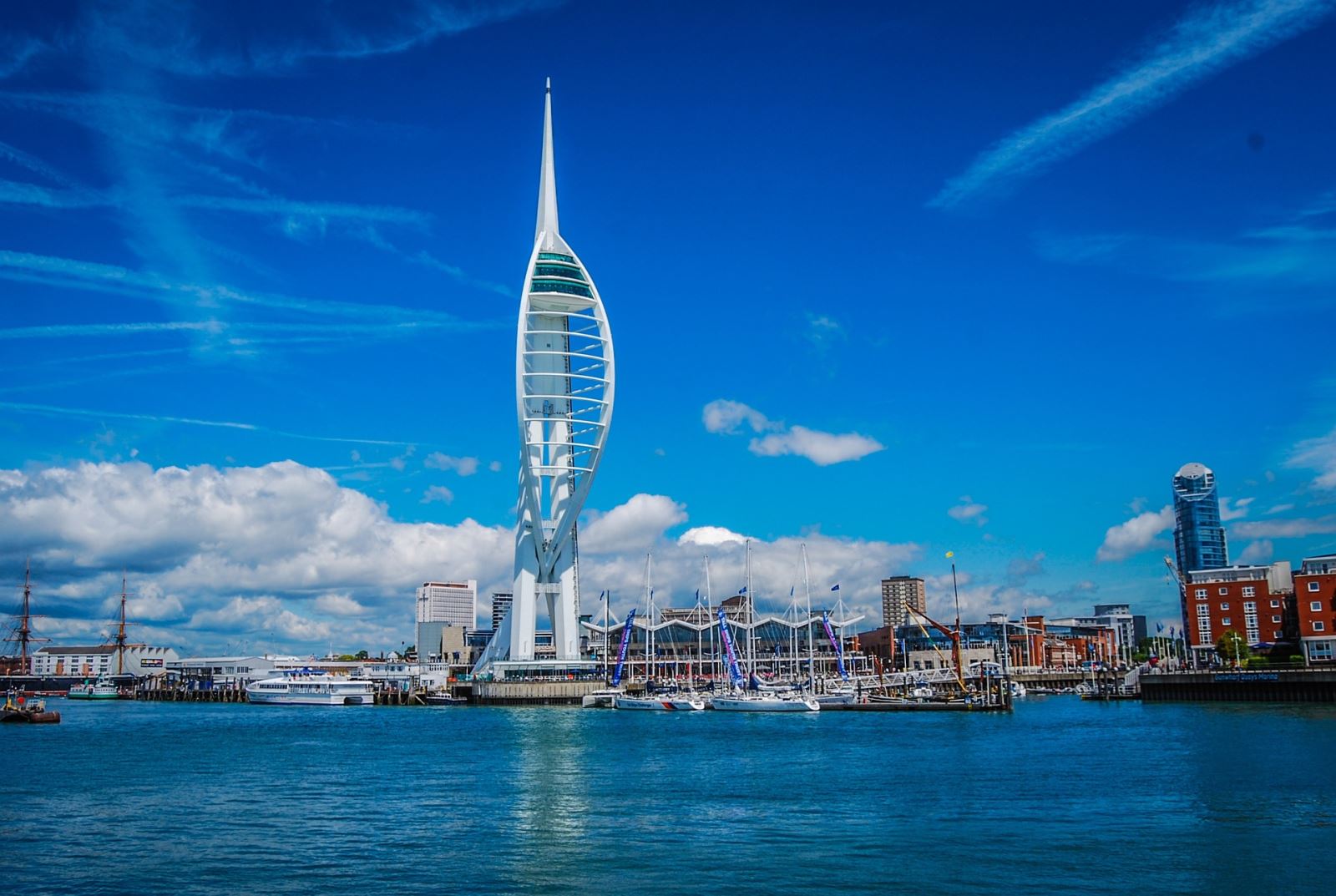 Photograph of the Spinnaker Tower against a blue sky